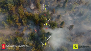 Press release image for Kongsberg Geospatial and FireSwarm Join Forces to Strengthen Early Wildfire Suppression and Drone Swarm Logistics