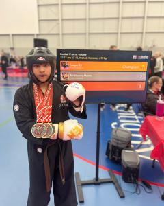 Press release image for Martial Artist Eli Cooper Opens 2026 Season with Three Gold Medals at Challenge Rive Nord