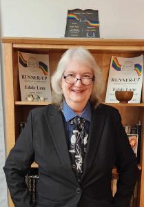 Press release image for Award-Winning Author Edale Lane Launches Epic Sapphic Post-Apocalyptic Series With ‘Frost and Iron’