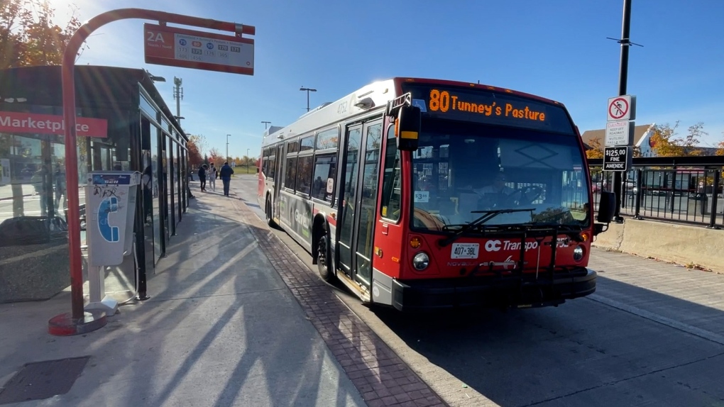 New Ways to Bus in Ottawa: A red OC Transpo bus on Route 80 at the Marketplace station